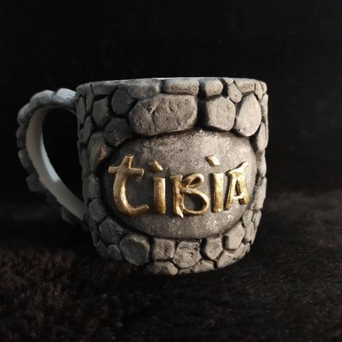 A mug in a Tibia style by Corner Magic